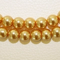 Detailansicht zweireihiger goldener Glasperlen für handgefertigten DIY-Schmuck - 6mm (1,4mm Loch) / Hellgelb