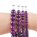 Purple natural stone beaded bracelets in four sizes 6mm to 12mm shown on wrist - 6mm (38cm/Strand approx 65pcs) / Charoite Color