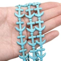 Detailed view of anchor-shaped synthetic turquoise beads for DIY jewelry making - Anchor (16x21mm)