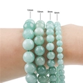 Green natural stone round beads for jewelry making in 6mm, 8mm, 10mm, and 12mm sizes - Emerald Jade Color