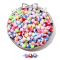 Macro view of colorful acrylic heart beads with marble texture for DIY jewelry making - Two-Tone Heart Bead (8mm)