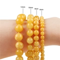 Comparison of 12mm 10mm 8mm and 6mm translucent yellow jadeite round bead bracelets - Amber Yellow