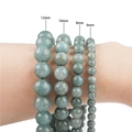 Natural light green stone bead bracelet collection showing 6mm 8mm 10mm 12mm sizes - Burmese Jade Color