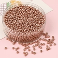Cuentas de vidrio metálico en oro rosa en una caja para hacer joyería artesanal - 2mm (10g/Paquete) / Rosa oro