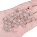 Polished translucent grey round crystal beads for DIY jewelry making held in hand - Transparent Jelly Round Bead / 8mm (20 Pieces/Pack) / Light Gray