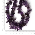Irregular raw purple amethyst stone beads on a strand with measurement ruler - 10-30mm 38cm/str Approx 50pcs / Natural Amethyst