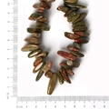 Polished unakite natural stone beads for DIY jewelry making on white background - 10-30mm 38cm/str Approx 50pcs / Unakite