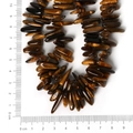 Brown tiger eye irregular stone beads for DIY jewelry making shown with a size ruler - 10-30mm 38cm/str Approx 50pcs / Natural Tiger Eye Stone