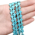 Cross shaped turquoise synthetic bead held in hand for DIY jewelry making size reference - Small Cross (8x10mm) / 1 Strand (Approx. 38 Pcs)