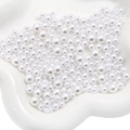 Mix of multiple sized white faux pearls without holes for DIY jewelry and crafts - 3-8mm / Pure White