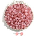 Pink shimmering mermaid resin beads for DIY bracelets displayed on a small tray - Bean Paste Red