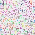 Macro shot of white acrylic square beads with colorful numbers and heart patterns for DIY - Square White with Fluorescent Numbers / 100 Pieces/Pack (6x6mm)