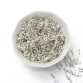 Silver twisted bugle beads for DIY jewelry making in a white ceramic dish - 10g/Pack (2x6mm, Approx. 300 Pcs) / Silver