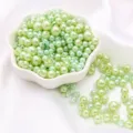 Light green ABS faux pearls in various sizes for DIY jewelry making and handmade crafts - Light Green