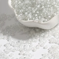 DIY craft beads 2-4mm clear cylinder glass seed beads for earrings and tassels in ceramic bowl - White