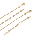 Detailansicht der 14K goldgefüllten minimalistischen dünnen Kette mit Karabinerverschluss - Perlen-Zwischenkette (Breite 2mm, Länge 50cm) / 14K Vergoldung