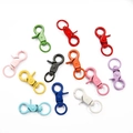 Close-up of colorful alloy lobster swivel clasps for DIY keychain making in various vivid colors - Width 23mm, Length 44mm, 4 Pcs/Pack / Swivel Trigger Snap / Multicolor