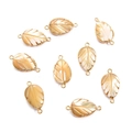 Leaf-shaped natural shell charms with golden metal edges and double hanging loops - Leaf Style