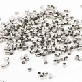 Top view of silver copper crimp tube beads for DIY necklace jewelry making - 1.5mm (500 Pieces/Pack) / White Gold