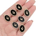 Elegant oval tulip flower charms in black enamel and gold finish for DIY jewelry - Oval Tulip / Black & Gold