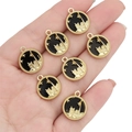Set of seven black enamel alloy charms with gold finish featuring castle and moon motifs - Black & Gold
