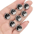 Set of 8 silver alloy round charms with black enamel castle and star for DIY jewelry - Round Castle Style / Black and Silver
