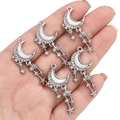 Five silver moon and star charms with pearly white inlays and tiny rhinestones for DIY crafts - Crescent With Tassel / White Silver