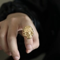 Detailed view of golden skull ring featuring Masonic Eye of Providence and gothic textures - US 7 / Gold
