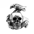 Macro detail of vintage stainless steel raven skull ring with EXPENDABLE engraving - Steel