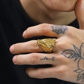 Detailed close-up of a golden wolf head ring featuring realistic punk rock style engraving - Size 7 / Gold
