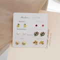Macro detail of a 6-pair mini earring set with fruit, cactus, and shell designs - Cactus Pineapple Shell Butterfly Pearl Rhinestone