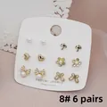 Detail of 6 pairs jewelry set with gold studs featuring pearls and rhinestones - Style 8 (Umbrella and Butterfly)