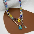 Collar retro de varias capas con cuentas de flores de vidrio millefiori coloridas y cadenas de plata - Estilo Floral en Capas