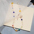 Chic handmade pearl necklace with colorful glass flowers and cute mushroom charms - Green Mushroom Lampwork Necklace
