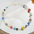Detalle de collar de perlas con cuentas de vidrio millefiori de colores y cierre dorado - Multicolor Hecho a Mano (JXJL-68)
