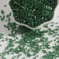 Deep green bugle beads for DIY jewelry and embroidery shown in a white porcelain bowl - 2mm (15g/Pack) / Dark Green