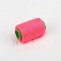 Sewing thread spool in vibrant neon pink on green plastic core for DIY craft and machine use - About 300 Meters / Peach Pink