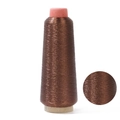Metallic bronze embroidery thread on cone with detailed macro texture view - Light Coffee