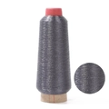 Charcoal grey metallic embroidery thread on cone with magnified texture detail view - Gray