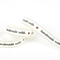 Creamy white ribbed handmade cotton ribbon with black text and small red heart - Grosgrain Beige Handmade (#42)