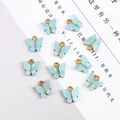 Light blue butterfly charms in alloy with gold trim for DIY jewelry making 10 pieces - 4 Pieces / Light Blue