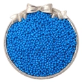 Polished bright blue round glass seed beads displayed in a decorative silver tray - Teal