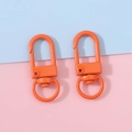Pair of bright orange metal swivel lobster clasps for DIY bag and keychain accessories - Orange Red