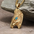 Macro shot of a golden eagle head pendant with a blue stone inlay on a rock background - Gold Color Pendant, No Chain