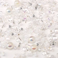 Mixed DIY jewelry beads including white pearls, clear beads, and silver accents for crafting - 10 g / White