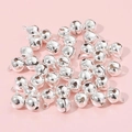 Set of polished silver metal bells with top hanging rings for DIY crafts and jewelry - 6mm 100 Pieces/Pack / Silver