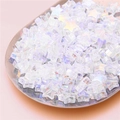 Iridescent white acrylic star beads for DIY jewelry making displayed on a tray - Star Style / 100 Pieces Pack (11x10mm) / Iridescent White