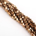 Strand of 6mm faceted bicone glass crystal beads in polished metallic bronze finish - 6mm 1 String/Pack (Approx. 40-45 Beads) / Bronze Plated