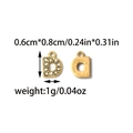 Detailed view of gold letter D pendant with sparkling crystals, size 0.6cm by 0.8cm - Letter D (TZ-TP1746-02)