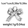 Pendentif noeud en acier inoxydable 304 poli de 1cm sur 1cm pour création de bijoux - Mini Nœud Papillon Argent (TP0710-01)